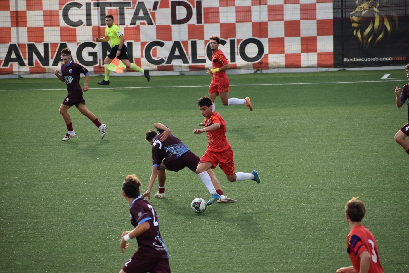 Nico dribbling past a Foligno defender